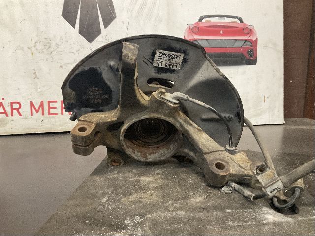 Steering knuckle bearing housing left