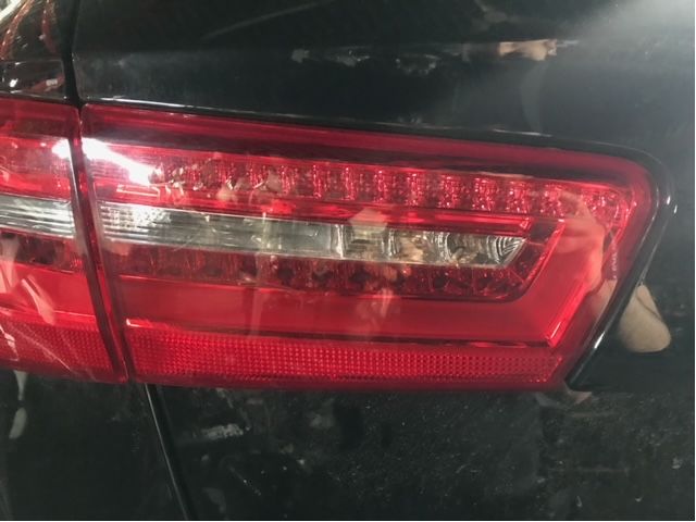 Tail light hatch left