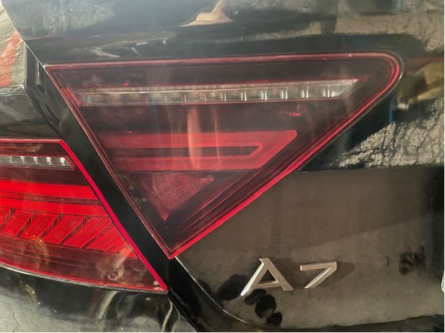 Tail light hatch left