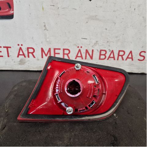 Tail light hatch left