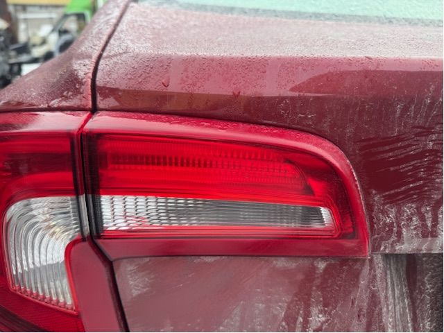 Tail light hatch left